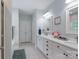 Bright bathroom with double vanity, framed mirrors, and a bathtub at 3178 Newcastle Dr # 42, Rock Hill, SC 29732