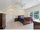 Bedroom with neutral color scheme, a large window, and a wooden bed frame at 3178 Newcastle Dr # 42, Rock Hill, SC 29732