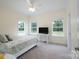 Bright bedroom with large windows, neutral carpet, and a ceiling fan at 3178 Newcastle Dr # 42, Rock Hill, SC 29732