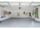 Clean, epoxy-floored garage with ample space and natural light at 3178 Newcastle Dr # 42, Rock Hill, SC 29732