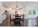Bright kitchen with stainless steel appliances, white cabinets, and an adjacent eating area at 3178 Newcastle Dr # 42, Rock Hill, SC 29732
