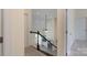 Elegant staircase with wooden handrail and white spindles at 3178 Newcastle Dr # 42, Rock Hill, SC 29732