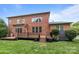 Brick home featuring a wooden deck, manicured lawn, and great natural light at 3206 Lakehurst Xing, Matthews, NC 28104