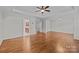 Flex room offering hardwood floors and easy access to other rooms in the home at 3206 Lakehurst Xing, Matthews, NC 28104