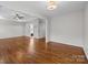 Spacious flex space with hardwood floors and easy access to other rooms at 3206 Lakehurst Xing, Matthews, NC 28104