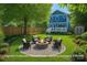 Backyard oasis with fire pit area and comfortable seating perfect for outdoor entertainment at 331 Solomon St, Charlotte, NC 28216