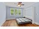 Bedroom with large windows and Murphy bed folded down at 331 Solomon St, Charlotte, NC 28216