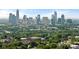 An impressive view of the Charlotte City skyline rising above the tree tops at 331 Solomon St, Charlotte, NC 28216