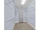 Walk-in closet with built-in shelving and wire racks to organize your wardrobe at 331 Solomon St, Charlotte, NC 28216