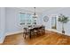 Inviting dining room with hardwood floors, natural light, and a modern chandelier at 331 Solomon St, Charlotte, NC 28216