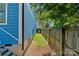Practical side yard for utilities or garden beds, offering functional outdoor space at 331 Solomon St, Charlotte, NC 28216