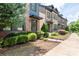 Charming brick townhouses with neat landscaping, well-maintained grounds, and inviting curb appeal at 344 Linestowe Dr, Belmont, NC 28012