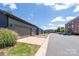 Street view of multiple attached garages with blue siding at 344 Linestowe Dr, Belmont, NC 28012
