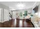 Spacious living room with natural light, stylish decor, and seamless flow to the entrance and staircase at 344 Linestowe Dr, Belmont, NC 28012
