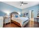 Comfortable main bedroom with hardwood floors, ceiling fan, and ensuite bathroom at 344 Linestowe Dr, Belmont, NC 28012