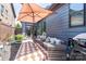 A covered patio with outdoor furniture and barbecue grill at 344 Linestowe Dr, Belmont, NC 28012