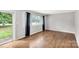 Sun-filled living room with hardwood floors and natural light, creating a comfortable atmosphere at 405 N Woodland Dr, Lancaster, SC 29720