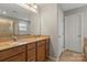 Bathroom featuring double sinks, granite countertops, and tile floors at 4095 Harmattan Dr, Denver, NC 28037