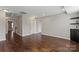 Light-filled room with hardwood floors, recessed lighting, neutral walls, and white trim and doors throughout at 4095 Harmattan Dr, Denver, NC 28037