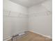 Empty walk-in closet, ready for your personal touch and storage solutions at 4095 Harmattan Dr, Denver, NC 28037