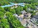 Aerial view of a residential neighborhood featuring lush greenery, tree-lined streets, and diverse home styles at 436 Third Baxter St, Fort Mill, SC 29708
