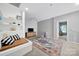 Bright bonus room with cozy built-in seating, a modern entertainment setup, and recessed lighting at 436 Third Baxter St, Fort Mill, SC 29708