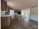 Eat-in kitchen with a spacious island and plenty of natural light at 493 Eagle Mills Rd, Hamptonville, NC 27020
