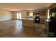 Open kitchen with stainless steel appliances and a center island at 493 Eagle Mills Rd, Hamptonville, NC 27020