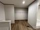Walk-in closet with white wire shelving and neutral wall color at 493 Eagle Mills Rd, Hamptonville, NC 27020