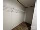 Walk-in closet with white wire shelving and neutral wall color at 493 Eagle Mills Rd, Hamptonville, NC 27020