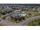 Aerial view showcasing community pool, clubhouse, and surrounding neighborhood at 5003 Singletree Ln, Indian Trail, NC 28079
