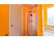 Walk in shower with glass doors with an orange paint color at 5003 Singletree Ln, Indian Trail, NC 28079