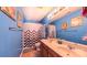 A bathroom with a double sink, warm lighting, and plenty of counter space at 5003 Singletree Ln, Indian Trail, NC 28079