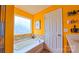 This bathroom includes a tub and a window with natural light at 5003 Singletree Ln, Indian Trail, NC 28079
