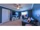 Spacious bonus room featuring neutral carpet, a ceiling fan, and gaming setup at 5003 Singletree Ln, Indian Trail, NC 28079