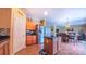 Open kitchen with stainless steel appliances, pantry, and center island, perfect for entertaining at 5003 Singletree Ln, Indian Trail, NC 28079