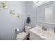 Clean powder room with a white sink, a toilet, and a decorative mirror at 5003 Singletree Ln, Indian Trail, NC 28079