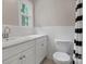 Bathroom featuring white tiled walls and white cabinets at 506 Richards Dr, Shelby, NC 28150