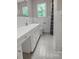 Bathroom with tile floors, white vanity and new fixtures at 506 Richards Dr, Shelby, NC 28150