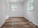 Cozy bedroom with wood-look flooring, a double window and a neutral color palette at 506 Richards Dr, Shelby, NC 28150