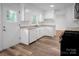 Bright kitchen features white cabinetry, granite countertops and stainless steel appliances at 506 Richards Dr, Shelby, NC 28150