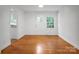 Living Room with wood floors, white walls and natural light from the window at 506 Richards Dr, Shelby, NC 28150