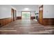 Spacious living room with hardwood floors and access to the porch through glass doors at 506 Richards Dr, Shelby, NC 28150