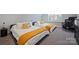 Upstairs bedroom with two twin beds and desk area. Space is well-lit with natural light and carpeted floors at 562 Preservation Dr, Fort Mill, SC 29715
