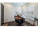 Office space with piano, wood flooring, and window with bright natural light at 562 Preservation Dr, Fort Mill, SC 29715