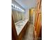 Bathroom featuring double sink vanity, large mirror, and separate shower and toilet area at 675 Godbey Rd, Salisbury, NC 28147