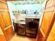 Laundry room with modern washer and dryer units, shelving and organized storage space at 675 Godbey Rd, Salisbury, NC 28147