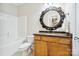 Bathroom featuring vanity with granite counter, with bathtub and toilet at 6795 Montgomery Rd, Lake Wylie, SC 29710