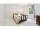 This bedroom features neutral walls, carpet flooring, and a large window at 6795 Montgomery Rd, Lake Wylie, SC 29710