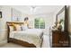 Cozy bedroom with a comfortable bed, soft lighting, and a serene ambiance at 6795 Montgomery Rd, Lake Wylie, SC 29710